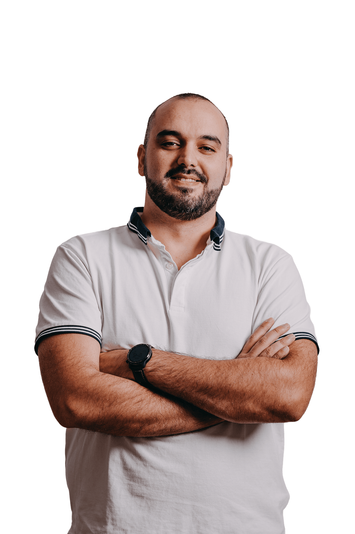 Photo of Miguel Cerejo sniling, wearing a white polo t-shirt and with his arms crossed